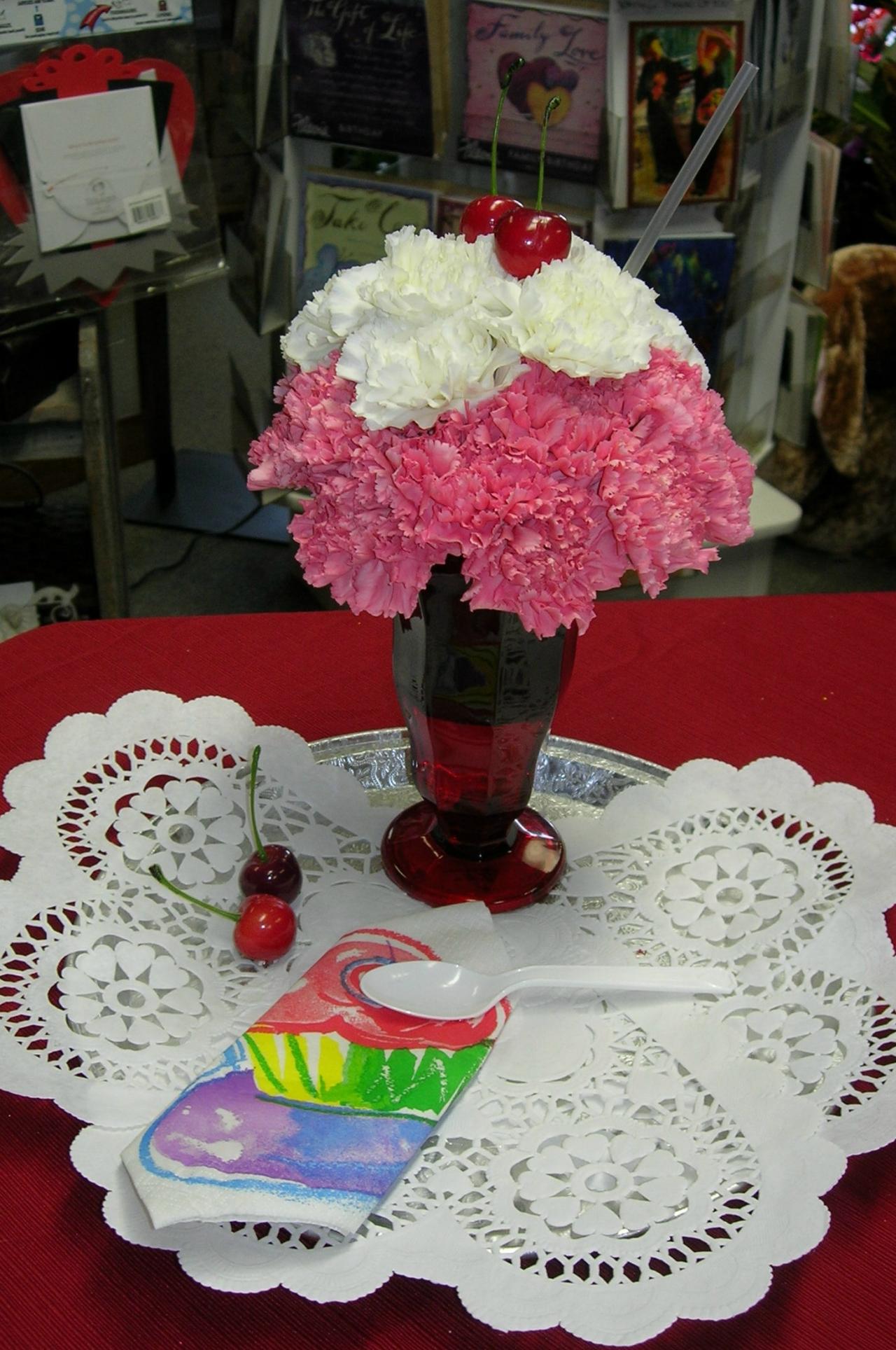 Party Decorations — Flowers in Vase that Looks Like an Ice Cream Sundae in Houston, TX