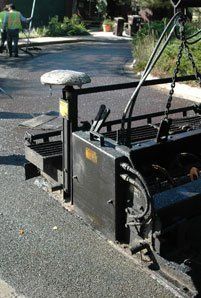 Rock Seal — Machine Flattening The Road in Denver, CO Rock Seal — Machine Flattening The Road in Denver, CO
