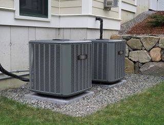Man Checking Air Filter — HVAC in Spartanburg, SC