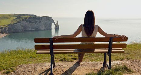 a lady sitting on the bench