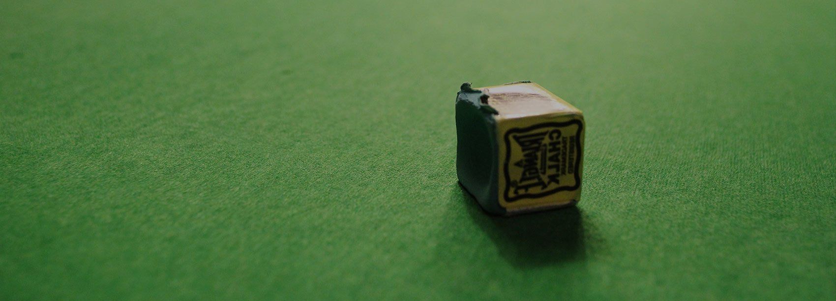Block of chalk on a snooker table