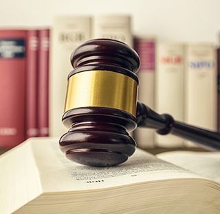 Law Book with Gavel — Cape Girardeau, MO — The Clubb Law Firm Law Book with Gavel — Cape Girardeau, MO — The Clubb Law Firm