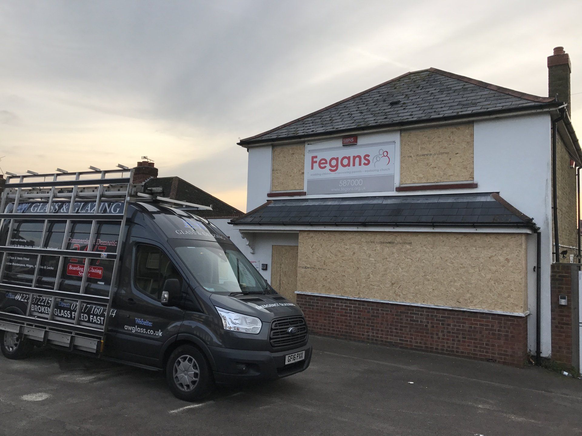 Fegans signboard on a house and company vehicle