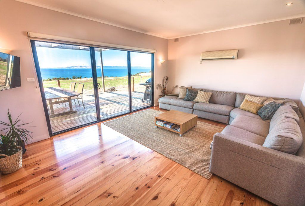 Family friendly lounge room with a view of the ocean