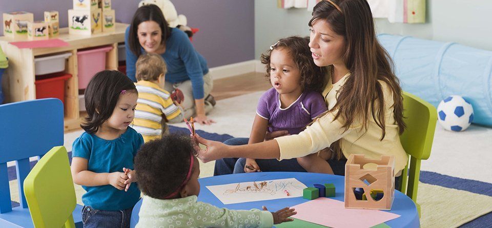 Children with their teachers