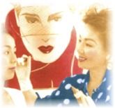Sue applying makeup