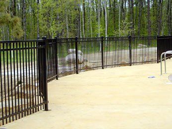 Tennis Court Fence — Black Ornamental Pool Fence in Deerwood, MN Tennis Court Fence — Black Ornamental Pool Fence in Deerwood, MN