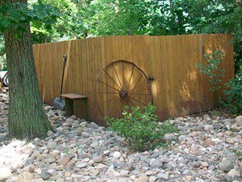 Warehouse Interior Fence — Wooden Fence in Deerwood, MN Warehouse Interior Fence — Wooden Fence in Deerwood, MN