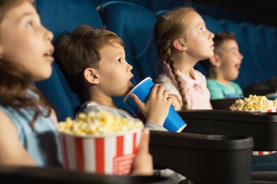 kid watching movie