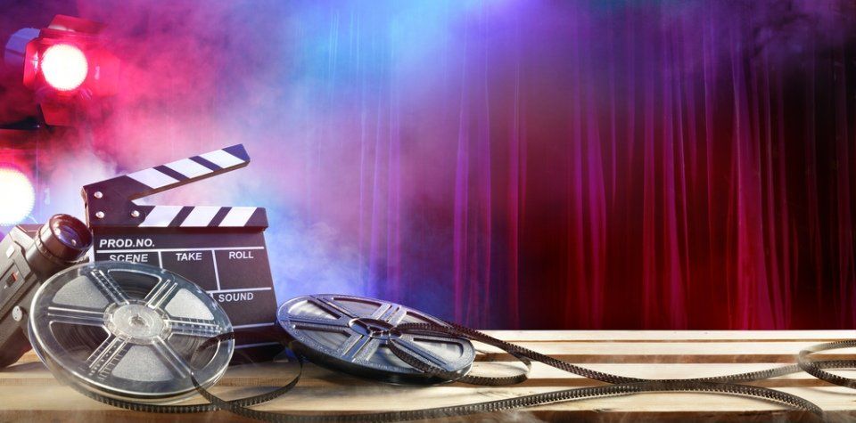 movie reel and clapperboard