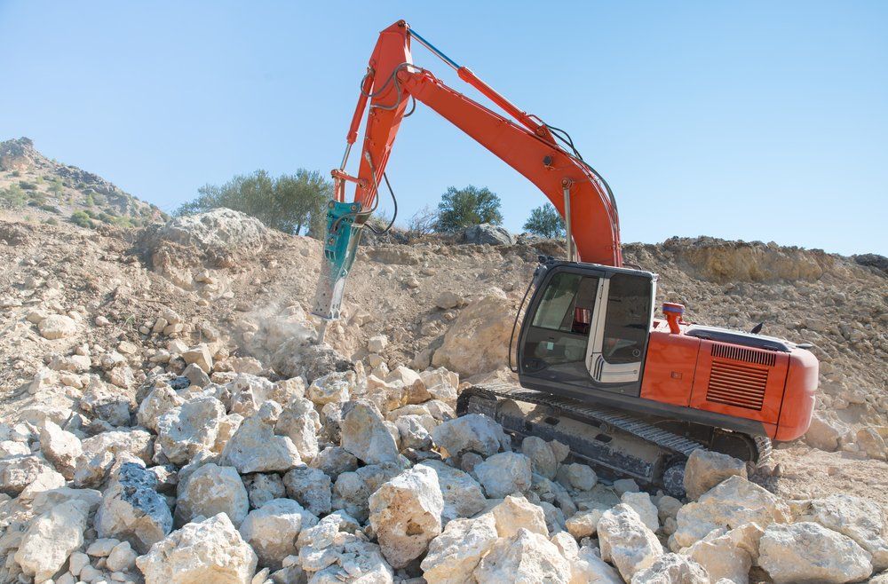 Rock Breaking in Christiansburg, VA | J.C. Martin, Inc. Rock Breaking in Christiansburg, VA | J.C. Martin, Inc.