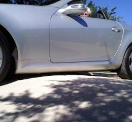 car on concrete driveway car on concrete driveway