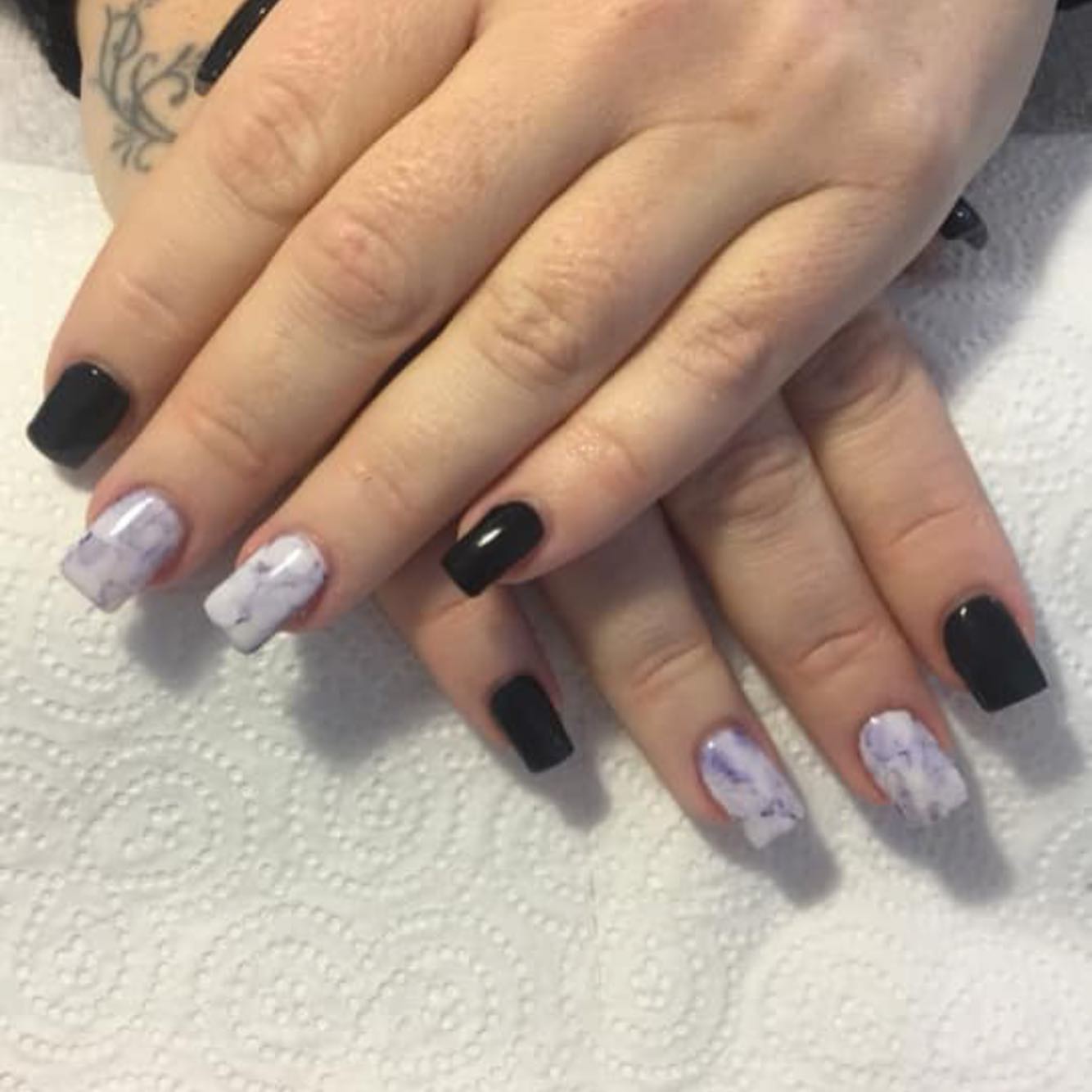 black and white patterned nail art