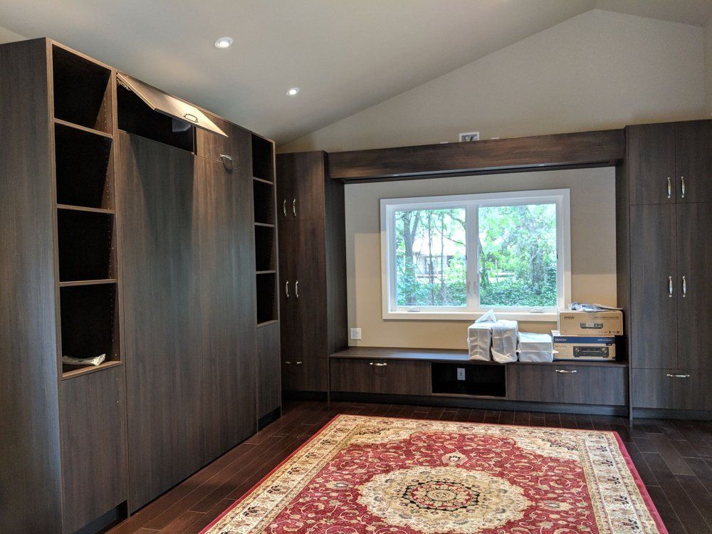 Entryway lined with custom craft cabinets.