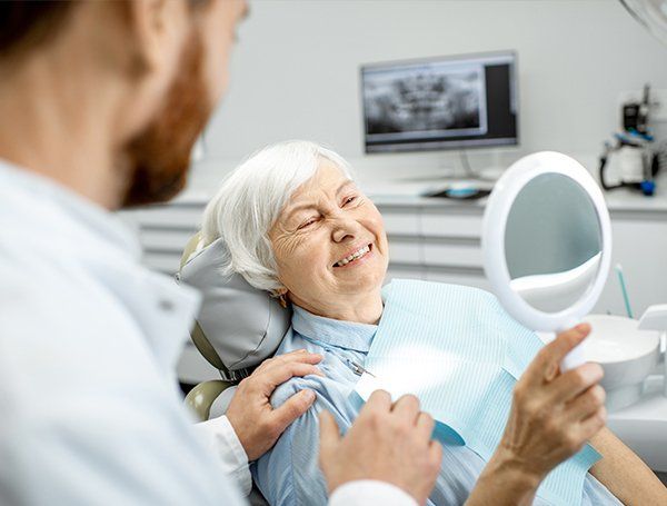 Senior Woman is Happy at Dental Visit — Richmond, VA — Dr. Babik & Associates Senior Woman is Happy at Dental Visit — Richmond, VA — Dr. Babik & Associates