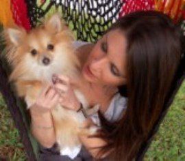 owner holding Pomeranian