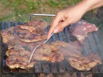 pork meat cooking on grill