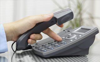 Hand Holding Phone While Dialing