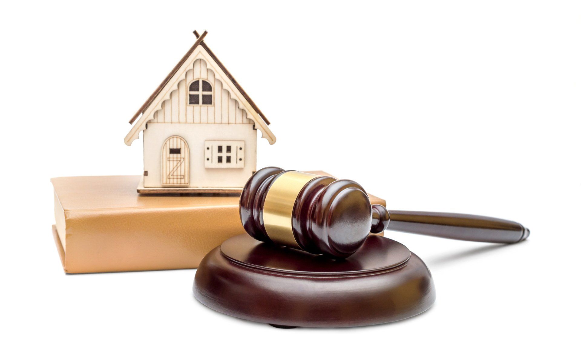 Mortgage elimination — Model of house with gavel in Lexington, OH Mortgage elimination — Model of house with gavel in Lexington, OH