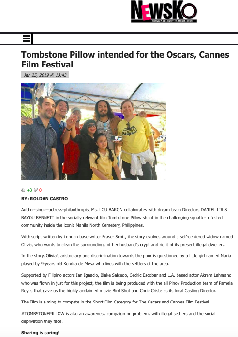 A group of people are posing for a picture at a film festival.