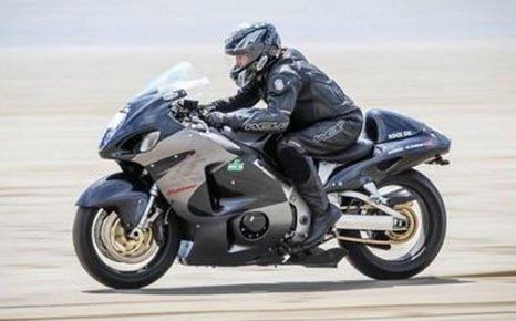 a man riding a motorcycle