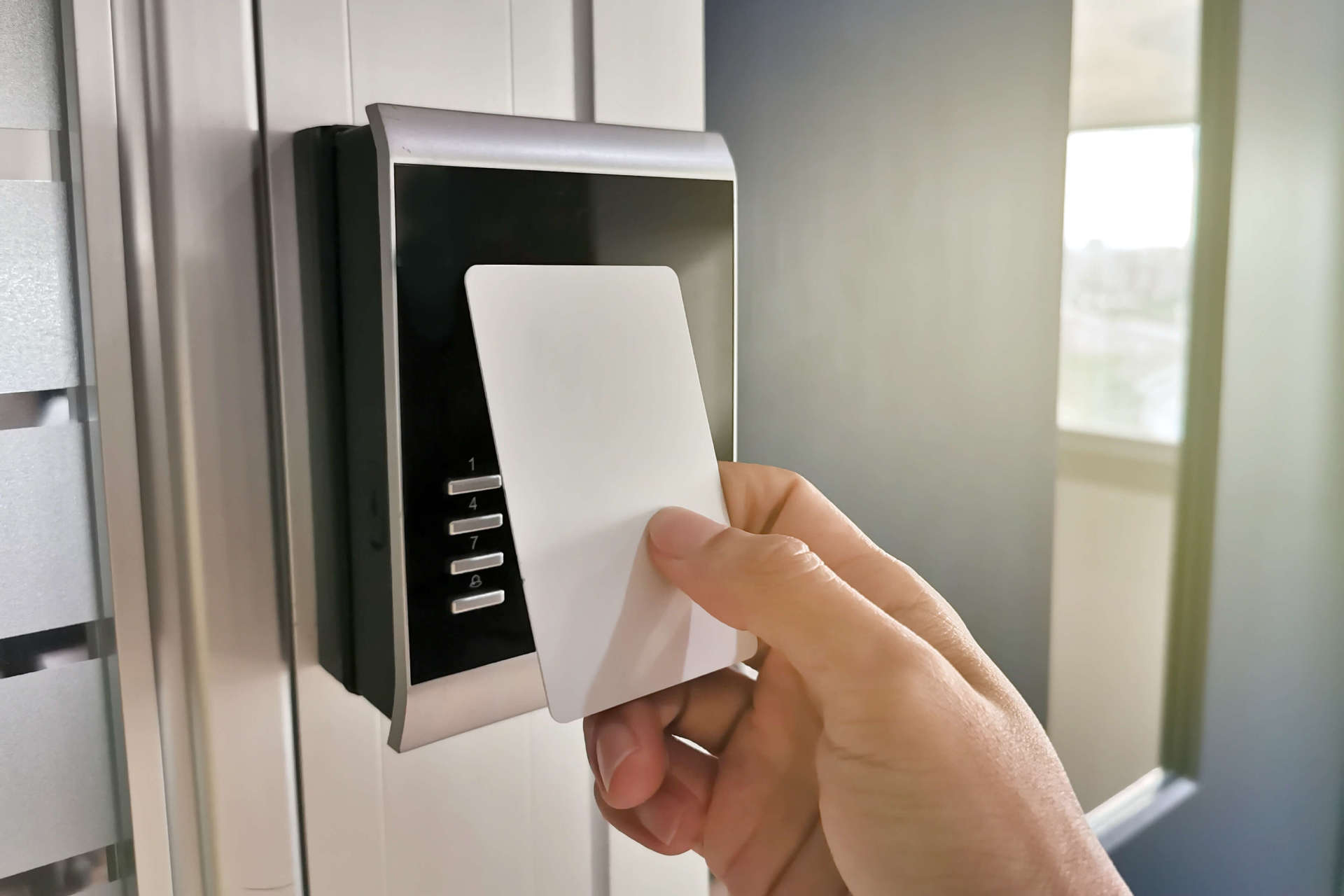 Hand Using Key Card — Hammond, IN — Columbia Lock & Key