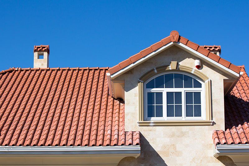 Tiled Roof Covering On House — Council Bluffs — Bates Roofing