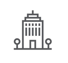 Office building icon with small trees on each side.