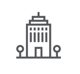 Office building icon with small trees on each side.