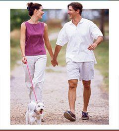 couple holding hands on a walk