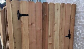 Newly installed cedar fence with gate — Fences in Pasadena, TX Newly installed cedar fence with gate — Fences in Pasadena, TX