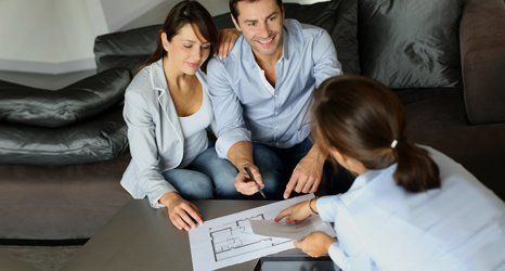building regulation advice being given to a couple