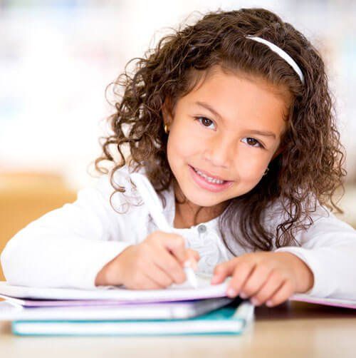 responsible little girl studying