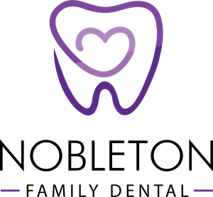 Purple tooth icon with heart center above 