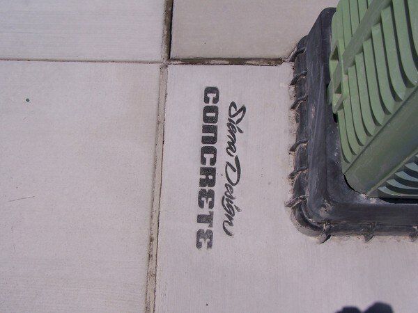 The word concrete is on a white surface