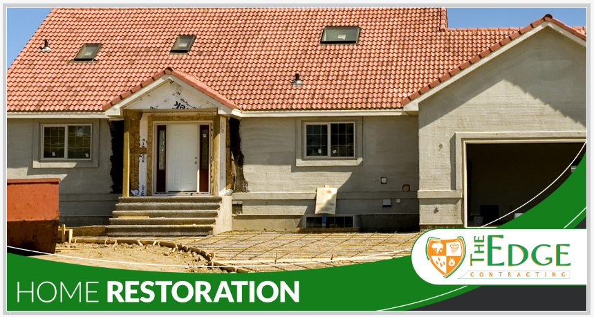 House Exterior Storm Restoration — Damaged House in Waukesha, WI