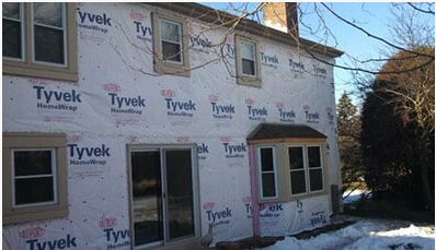 Home Restoration — Damaged Exterior Property Of The House in Waukesha, WI