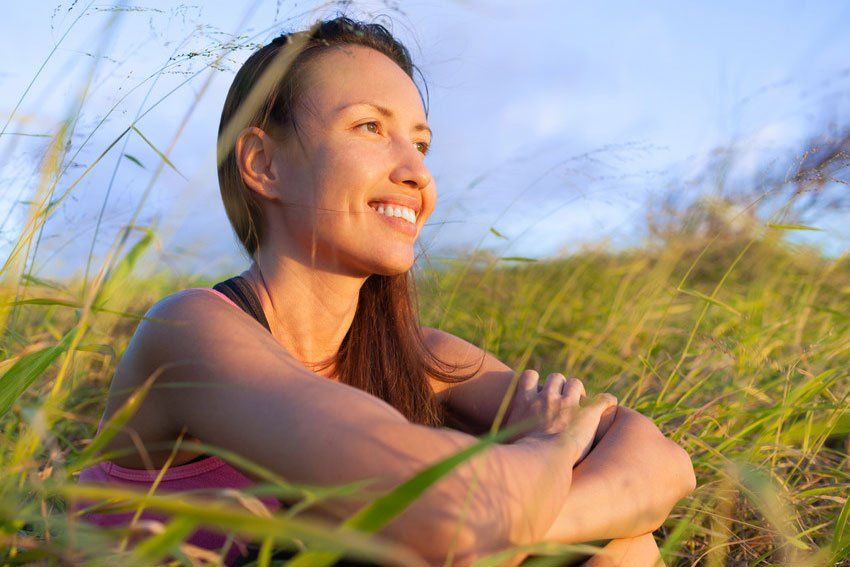 Smiling woman in field