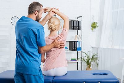 Stretching Patient's Arm — Clinton, IA — Riverview Chiropractic Stretching Patient's Arm — Clinton, IA — Riverview Chiropractic