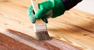Interior Staining — Painter staining the wood in Carson CIty, NV Interior Staining — Painter staining the wood in Carson CIty, NV