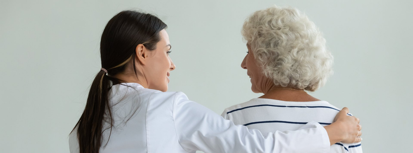 caregiver with an old lady