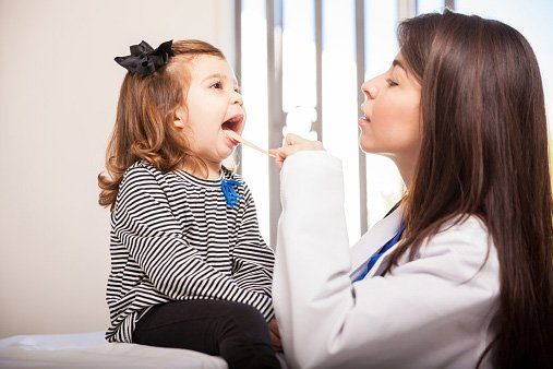 Pediatrician examining girl for urgent care - Urgent Care in Plant City, FL Pediatrician examining girl for urgent care - Urgent Care in Plant City, FL