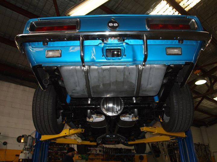 blue car on lift