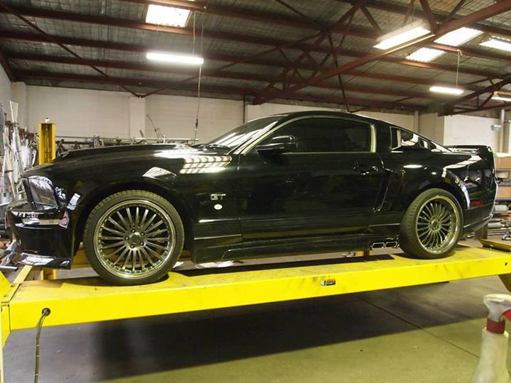 black car on lift