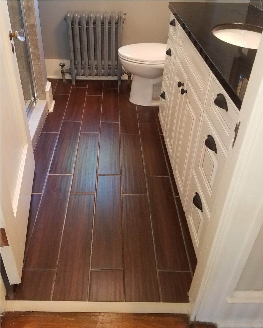 Ceramic tile with wide plank look