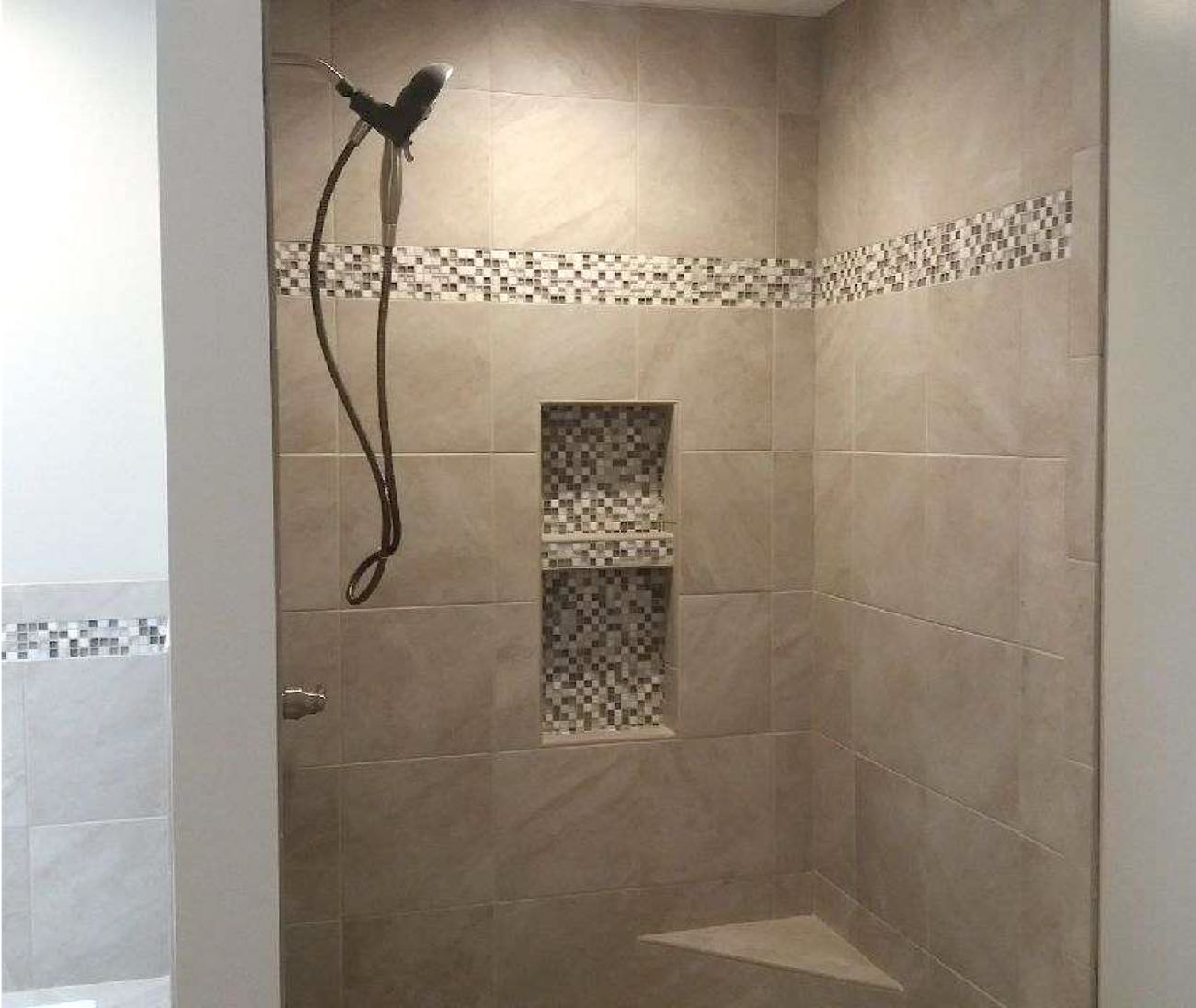 Tone-on-tone tile and inlays make this bathroom makeover a success!