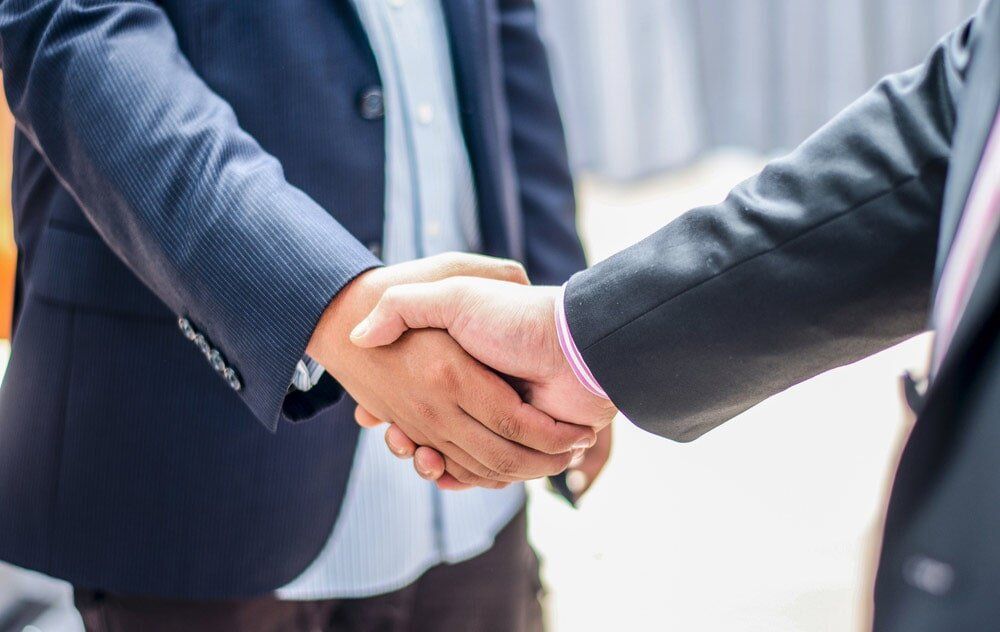 Man Shaking Hands And Talking For Process Service — North Coast Commercial Doors in Newcastle, NSW