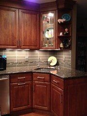 Dark Wood Cabinets - Modern Trend Kitchens & Baths