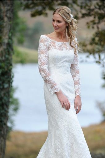 Bespoke wedding dresses by Forget Me Not Designs Bride by a lake in a Forget Me Not Designs wedding dress