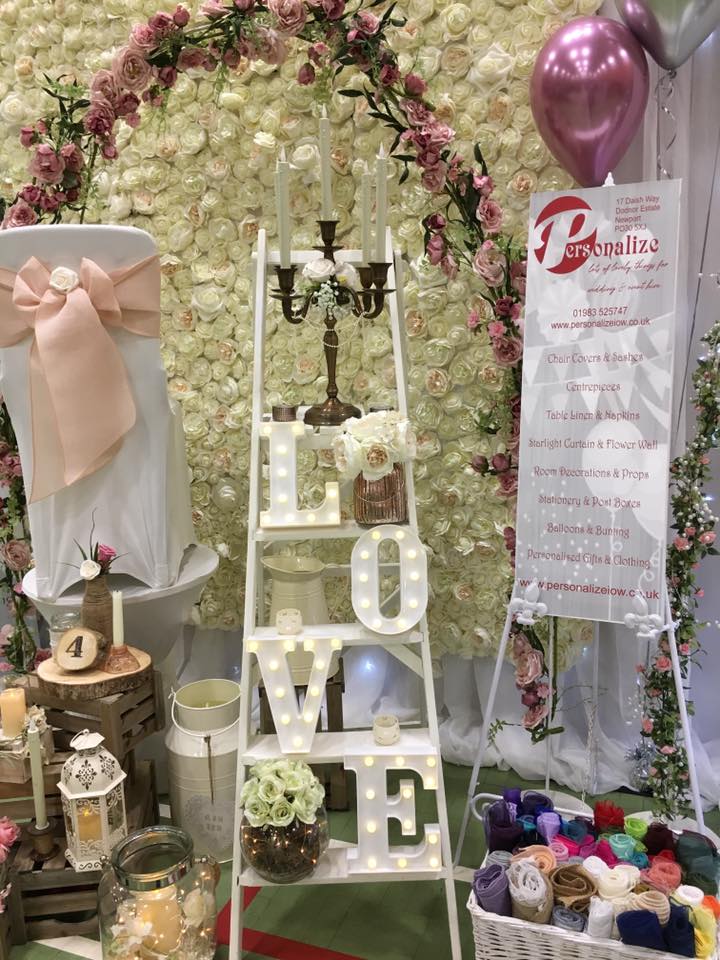 Wedding decor display with floral arch, 